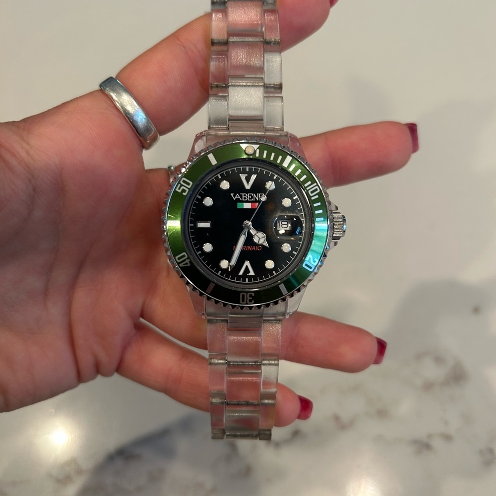 Black and Silver Watch with Green Bezel